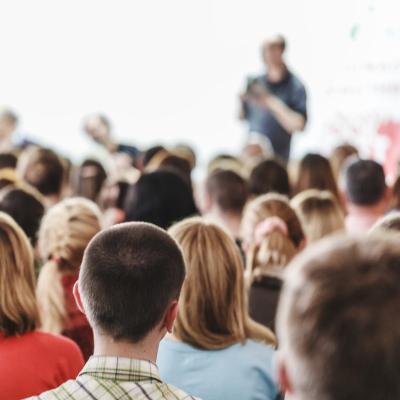 Speaker addresses audience at an event